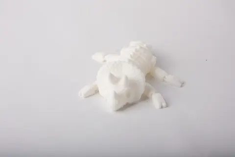 Knitted Dinosaur Skeleton Flexi Toy — 3D printed flexi reptile